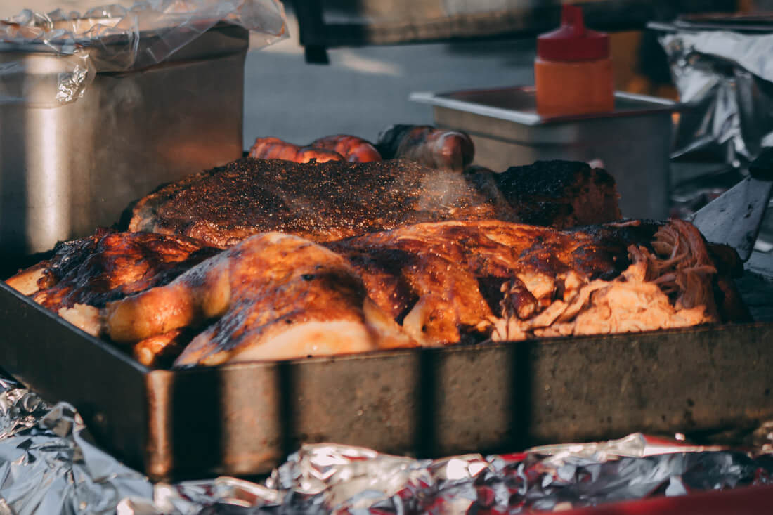 Full Belly BBQ serving customers at a farmer's market