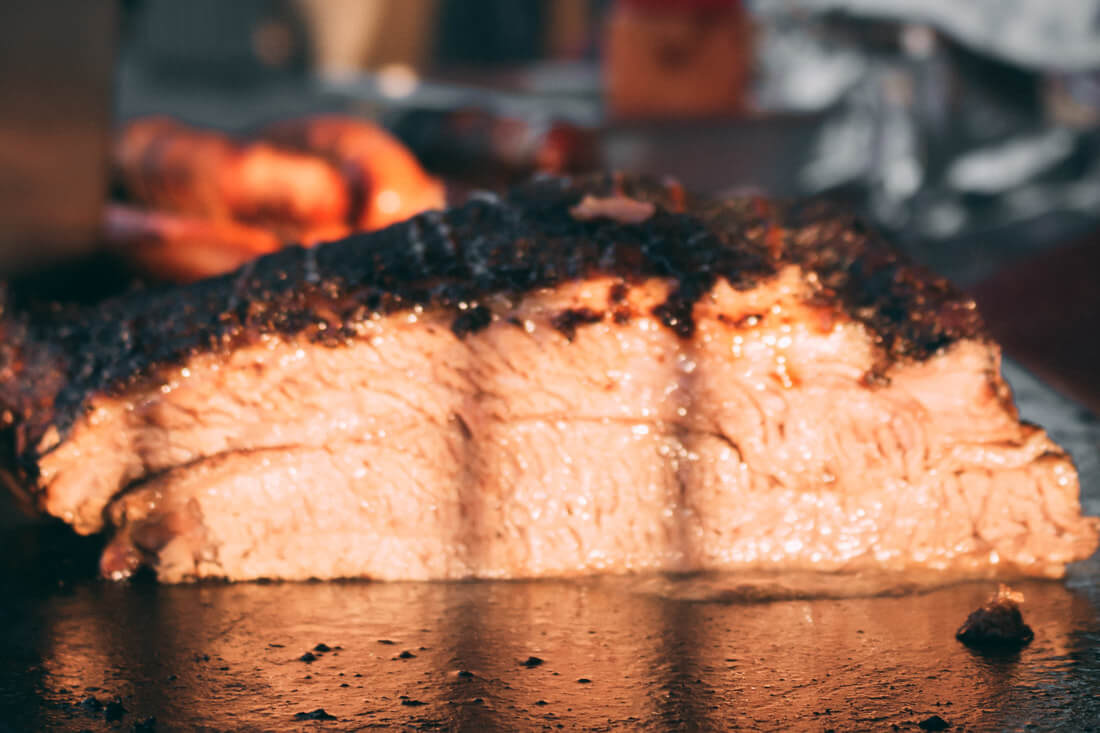 Fresh BBQ meat being prepared at Full Belly BBQ