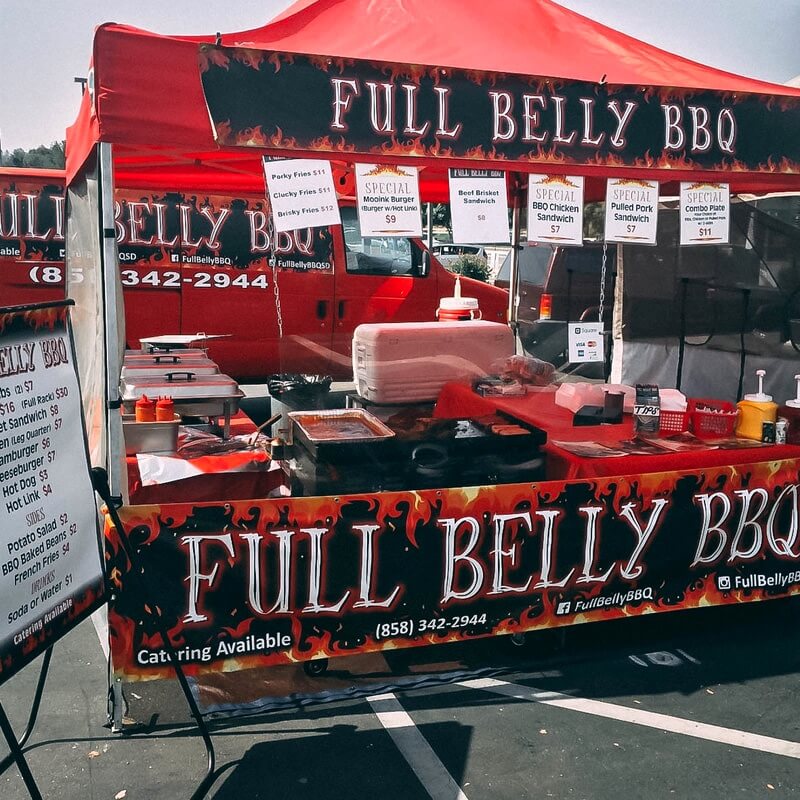 Full Belly BBQ tent setup for outdoor events